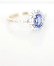 Wunderschöner Halo Tansanit Ring mit Diamanten in 375/000 Gelbgold B3508